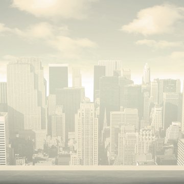 man in black suit looking at city buildings online stock trading